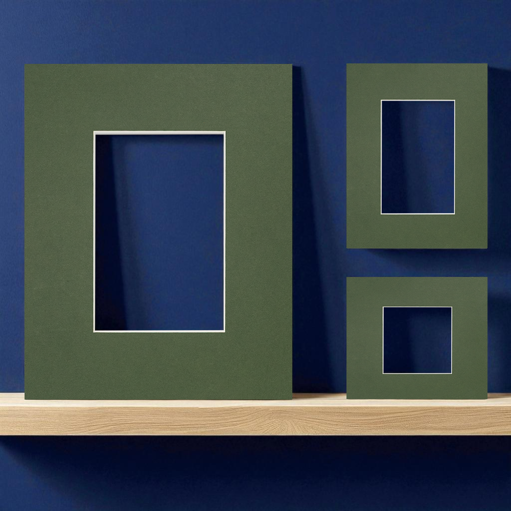 Dark green picture mounts displayed elegantly